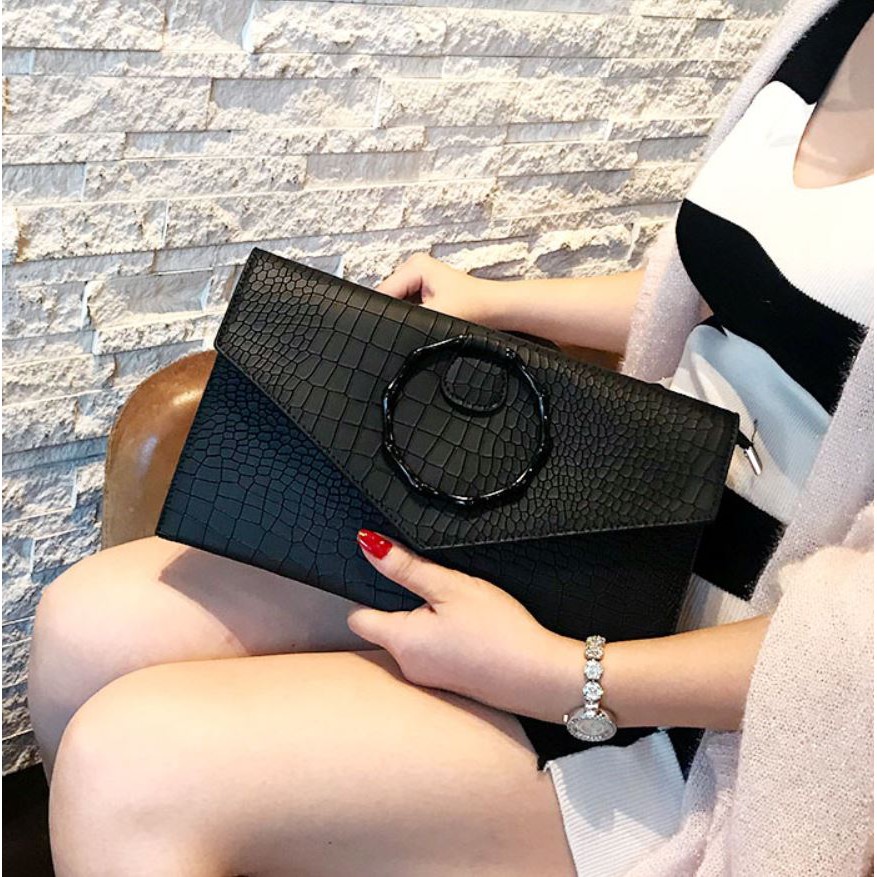 [Về lại]CLUTCH DỰ TIỆC CẦM TAY KHOEN TRÒN