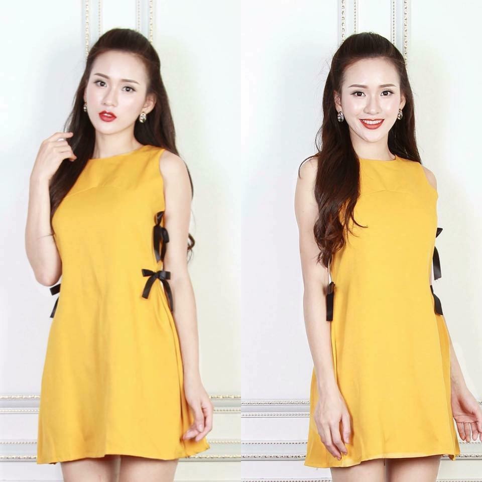 váy vàng thắt nơ eo