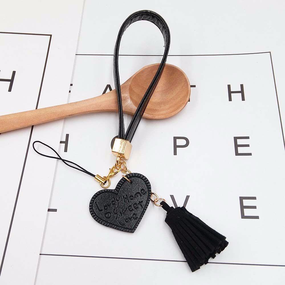 Dây Đeo Cổ Tay Bằng Da PU Chống Thất Lạc Hình Trái Tim Cho Điện Thoại