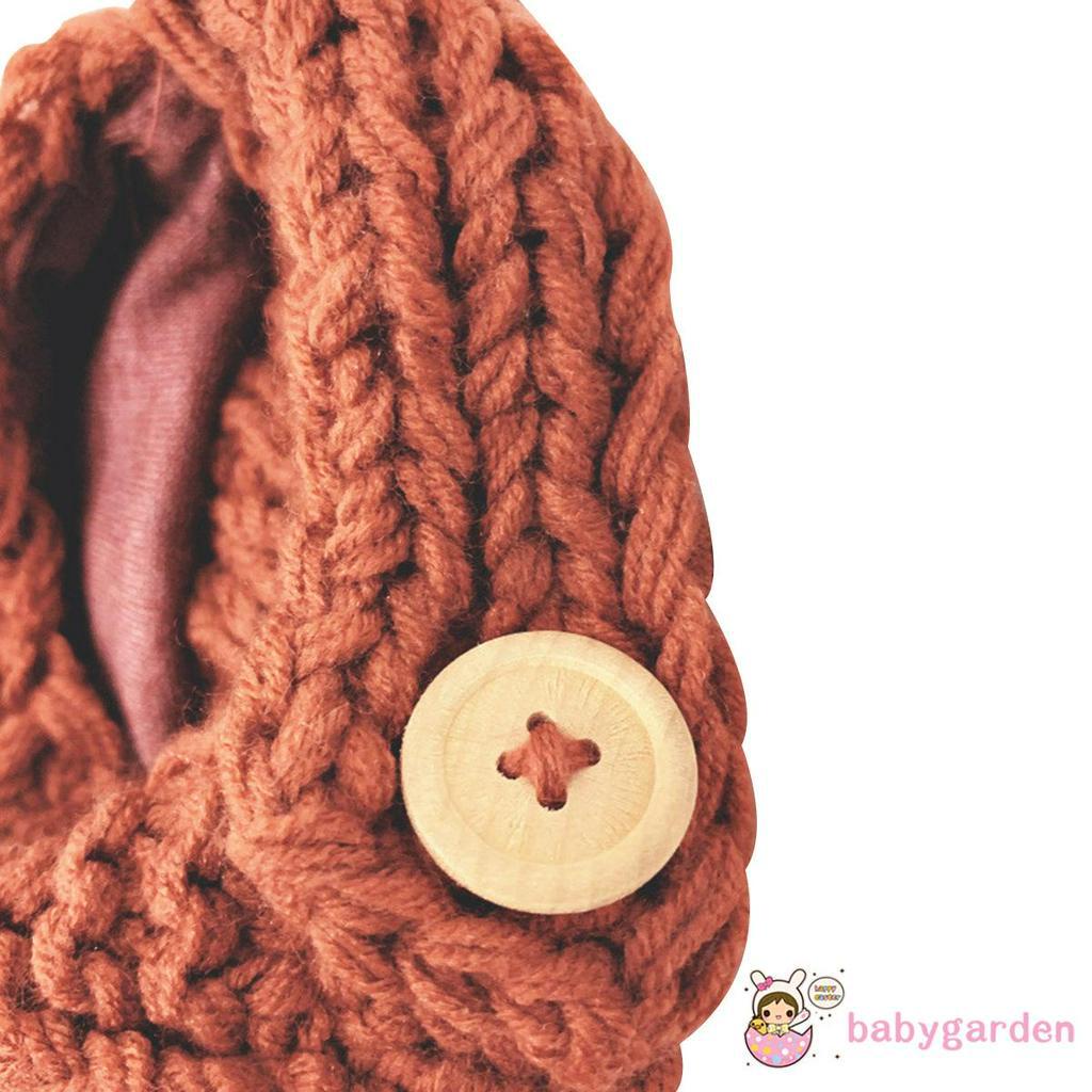 Mũ len trùm tai màu trơn có quả bông dễ thương cho trẻ em