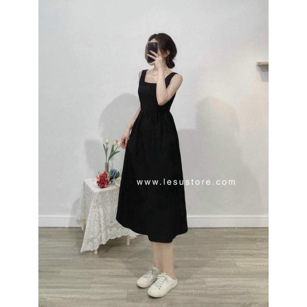 Đầm midi đen hở lưng