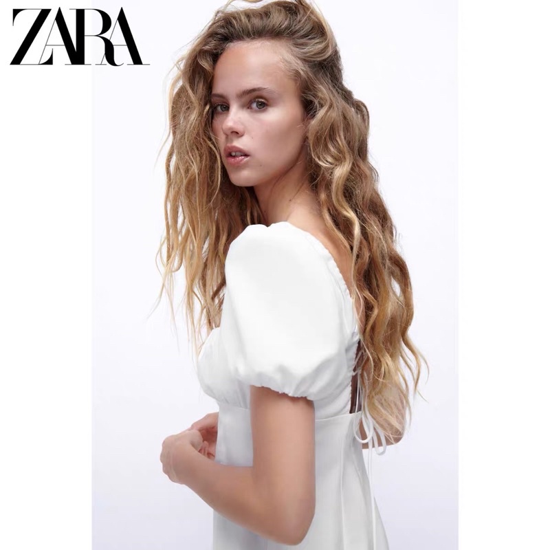 Váy midi trắng cổ vuông đan lưng xẻ Zarrraa