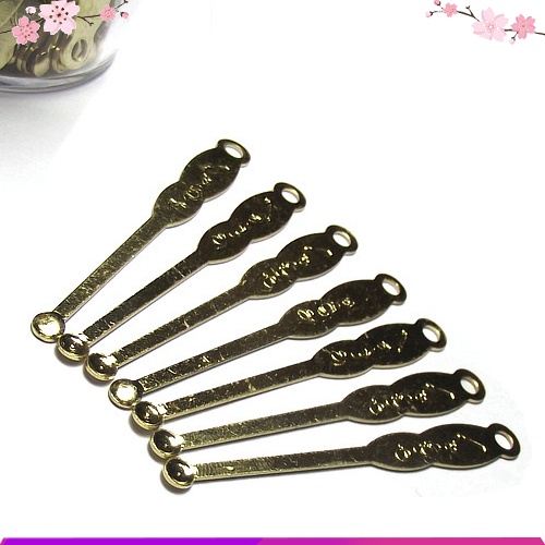 Dụng cụ lấy ráy tai bằng thép có lỗ gắn móc khóa