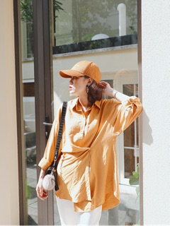 Sơ mi đính khuy lệch