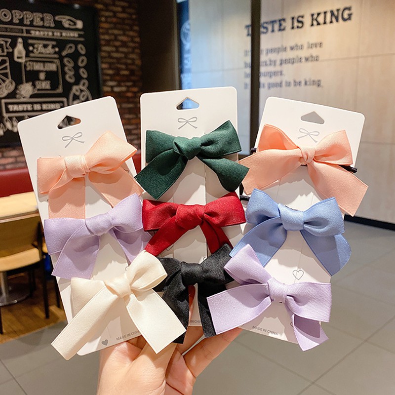 Kẹp tóc đính nơ phong cách ngọt ngào đáng yêu cho nữ