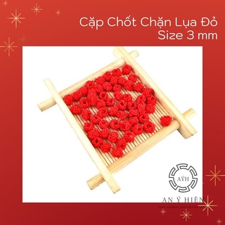 Chốt chặn lụa đỏ