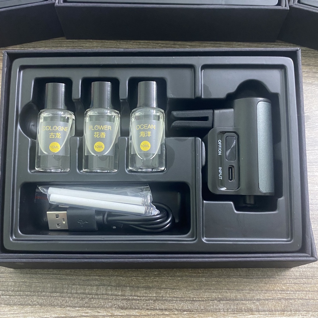 Máy khuếch tán tinh dầu nước hoa cài khe gió điều hòa xe hơi