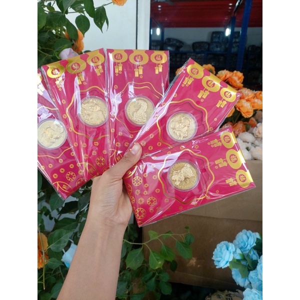 Bao lì xì thần tài mạ vàng may mắn rước tài lộc.