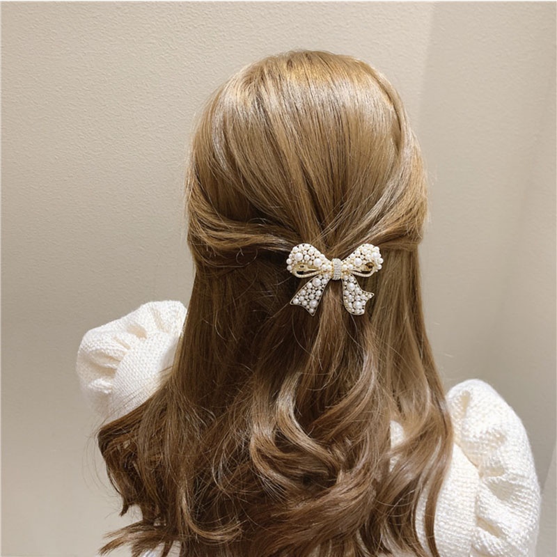 Kẹp tóc hình nơ đính ngọc trai nhân tạo phong cách Hàn Quốc dễ thương