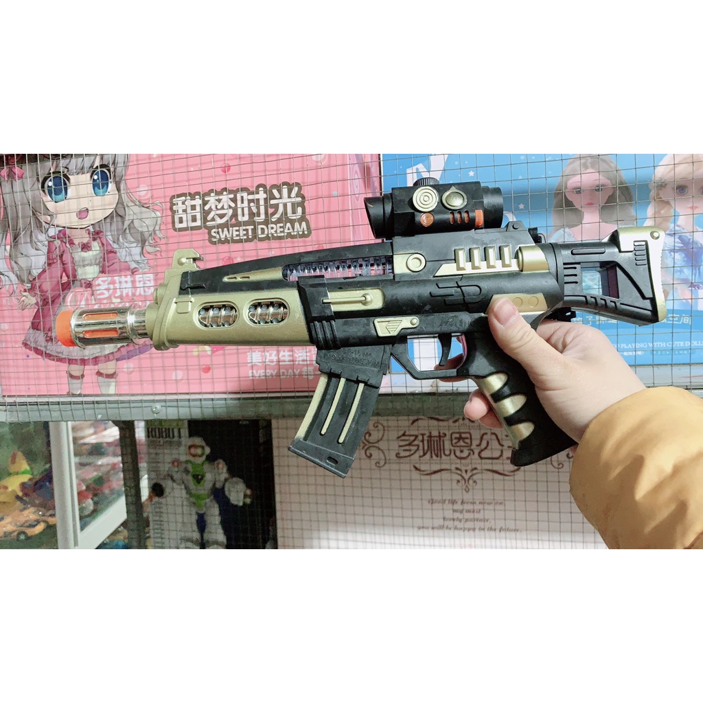 Súng đồ chơi chạy pin có đèn và nhạc - Đồ chơi SÚNG DÙNG PIN cho trẻ em.