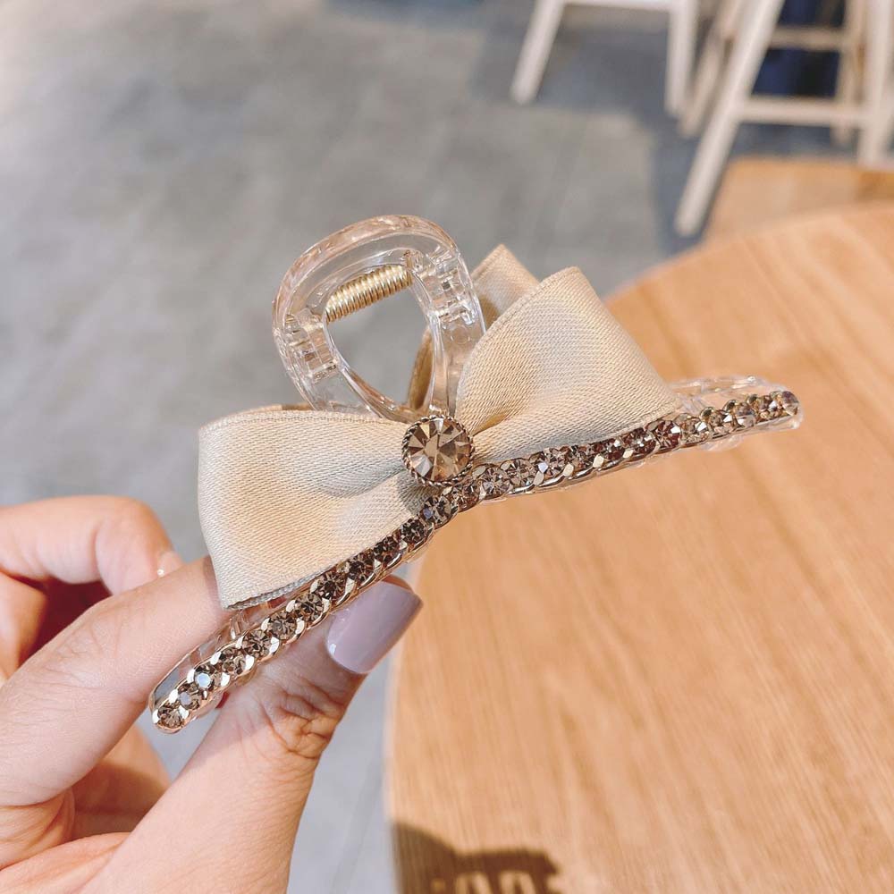 Kẹp tóc phối nơ thời trang xinh xắn cho nữ