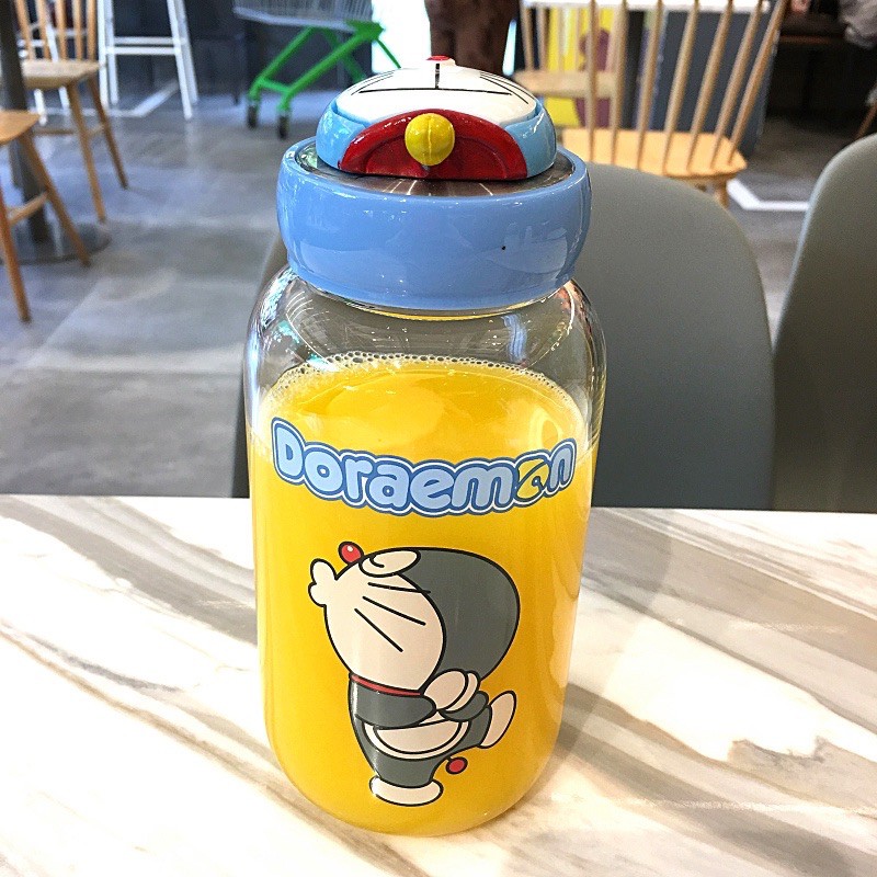 Bình Nước Doraemon, Bình Nước Hello Kitty Kèm Túi 600ML Cực Xinh