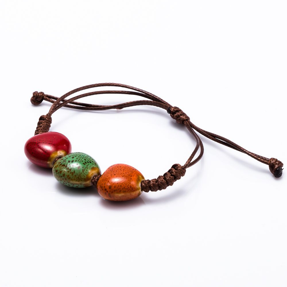 Vòng Đeo Tay Kết Hạt Sứ Hình Chiếc Lá Cho Nam Và Nữ