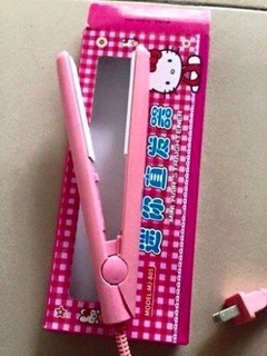 Máy dập xù tóc mini