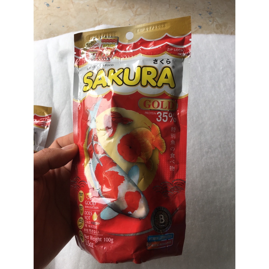 Cám cá KOI SAKURA gói 100g nhập THÁI LAN, cỡ hạt B(BABY) dùng cho các loại cá nhỏ.