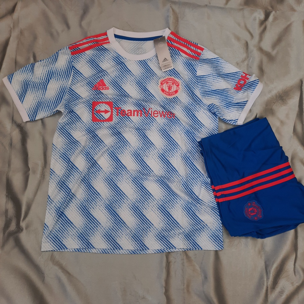 Bộ đá banh MU xanh sân khách hàng thái