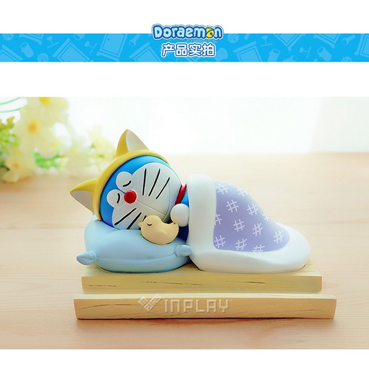 Mô hình doremon , doraemon kèm giá đỡ điện thoại hàng chính hãng