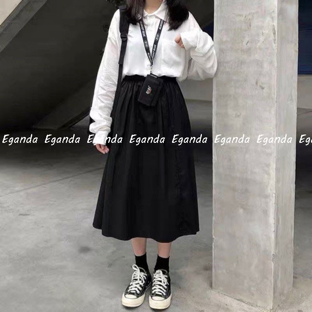 Chân váy dài vải đũi dáng xoè, có túi xẻ .