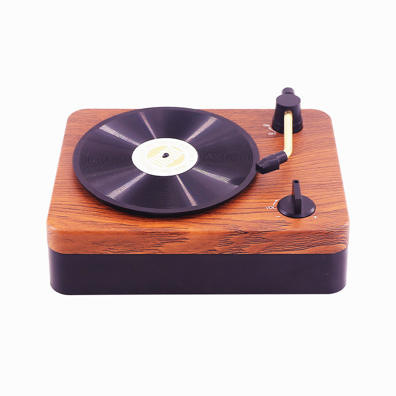 Nguyên tử đen cao su phong cách retro Walnut Máy ghi âm không dây Bluetooth Loa mini Prince máy tính âm thanh di động đi