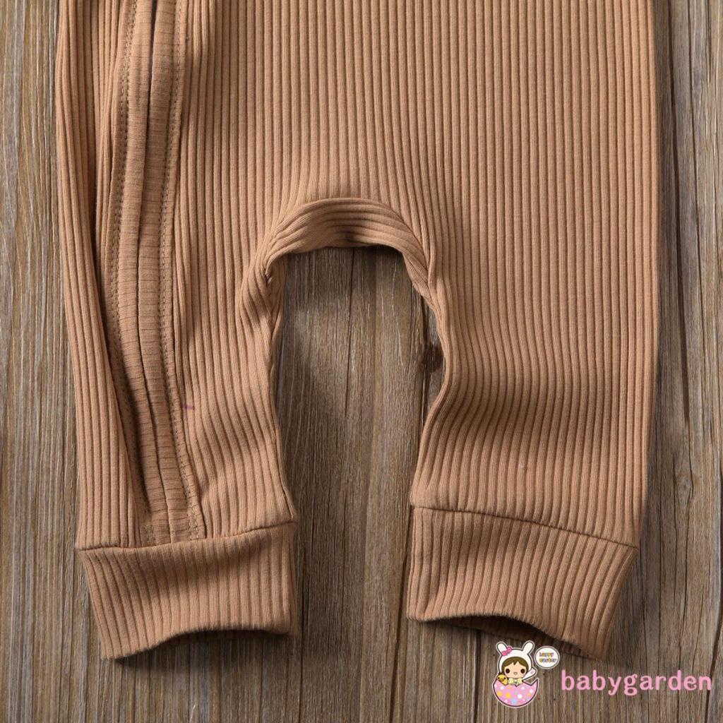 Bộ áo liền quần cổ tròn tay dài màu trơn cài nút phối khóa kéo thời trang cho bé