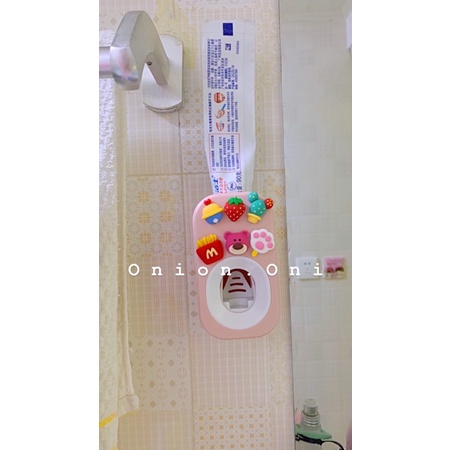 DỤNG CỤ NHẢ KEM ĐÁNH RĂNG TỰ ĐỘNG