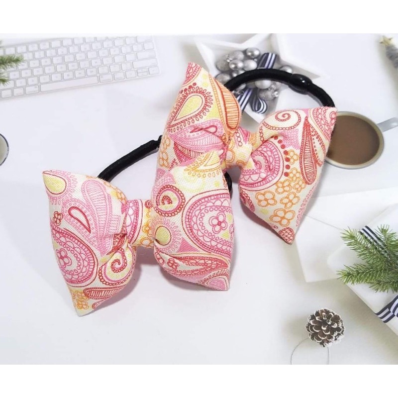 Chun cột tóc hình chiếc nơ nhồi bông