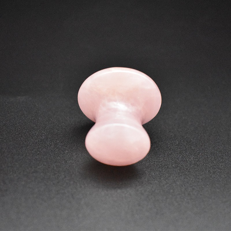 Dụng cụ lăn mát xa mặt bằng đá thạch anh hồng cho nữ