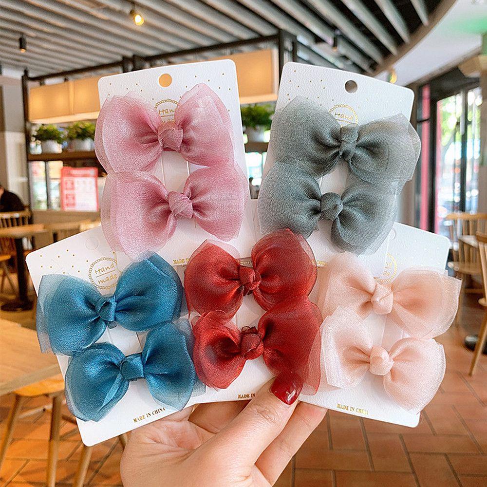 Bộ 2 Kẹp Tóc Nơ Vải Gạc Ngọt Ngào Cho Bé Gái