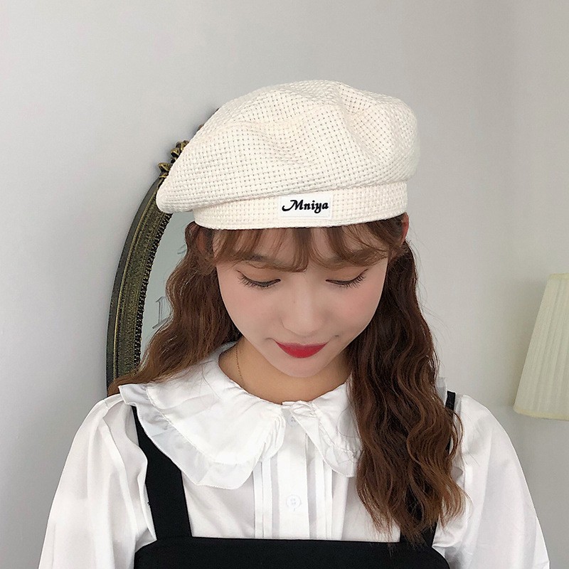 Beret hat with checkered and vintage style letters for women