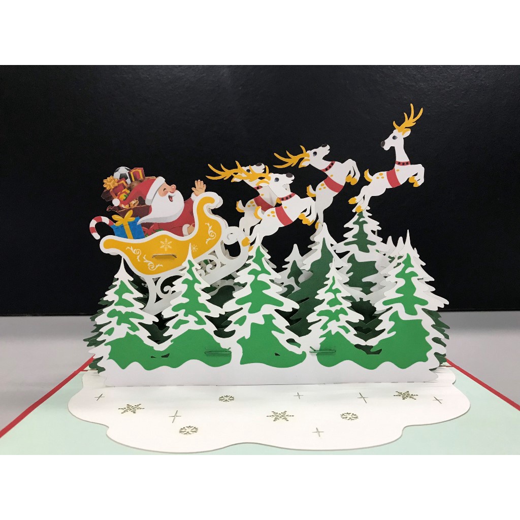 Thiệp Giáng Sinh HMG Hình Ảnh Ông Già Noel Cùng Chiếc Xe Tuần Lộc Dễ Thương