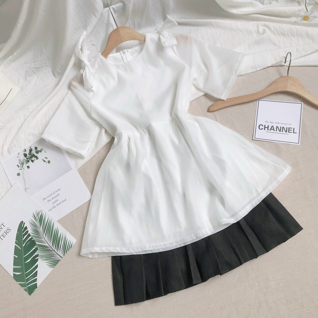 Set váy gồm áo peplum và chân váy xếp ly xòe