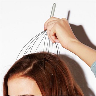Dụng cụ massage đầu tóc cầm tay