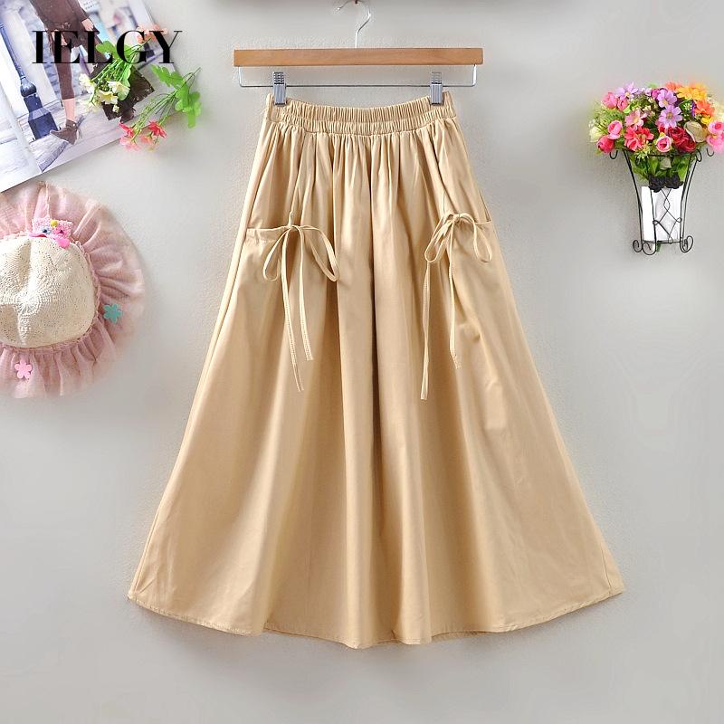 Đầm dài vừa IELGY đính nơ dễ phối đồ cho nữ