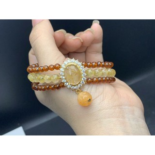 Vòng tay mặt tóc vàng
