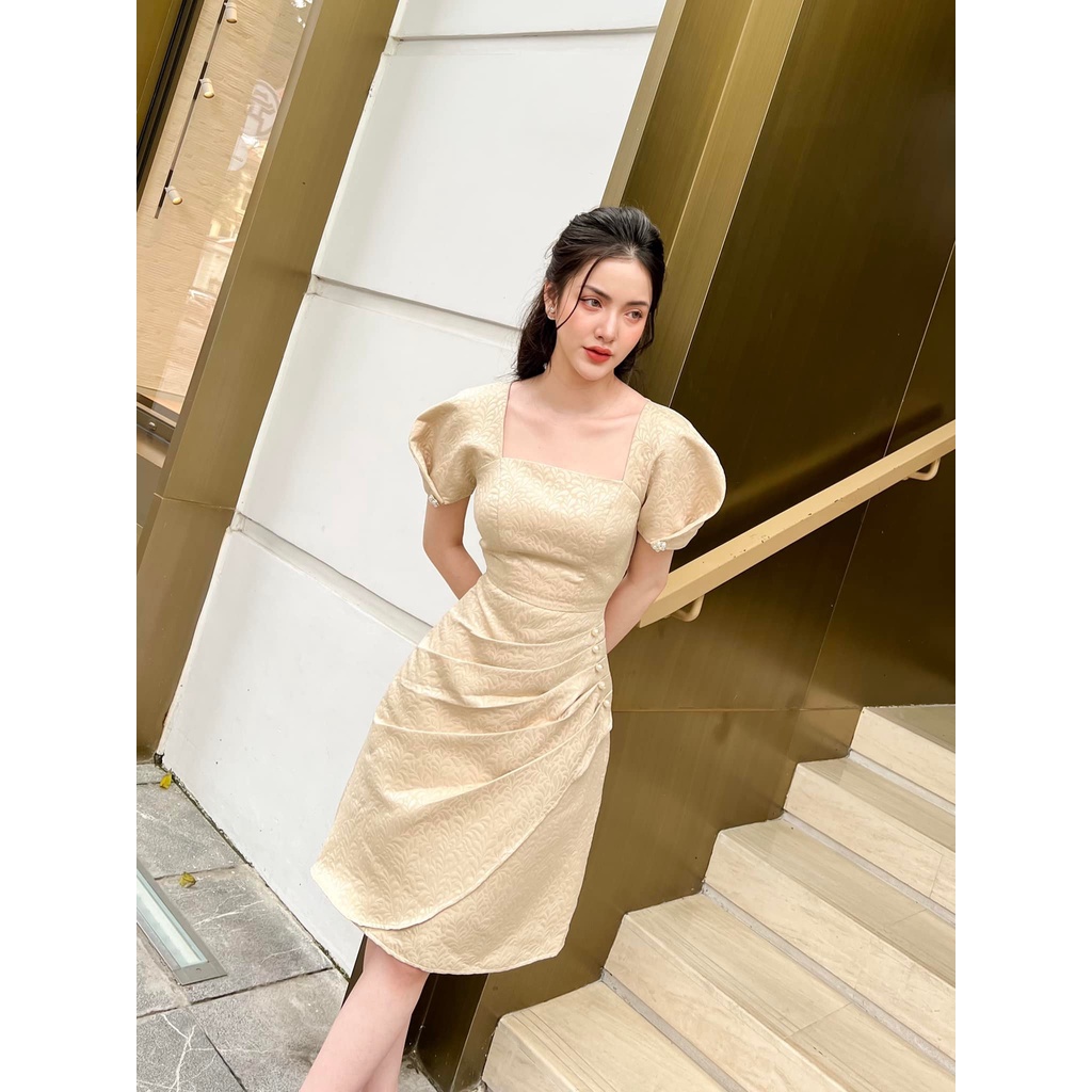 Váy gấm cúc trai vạt lệch