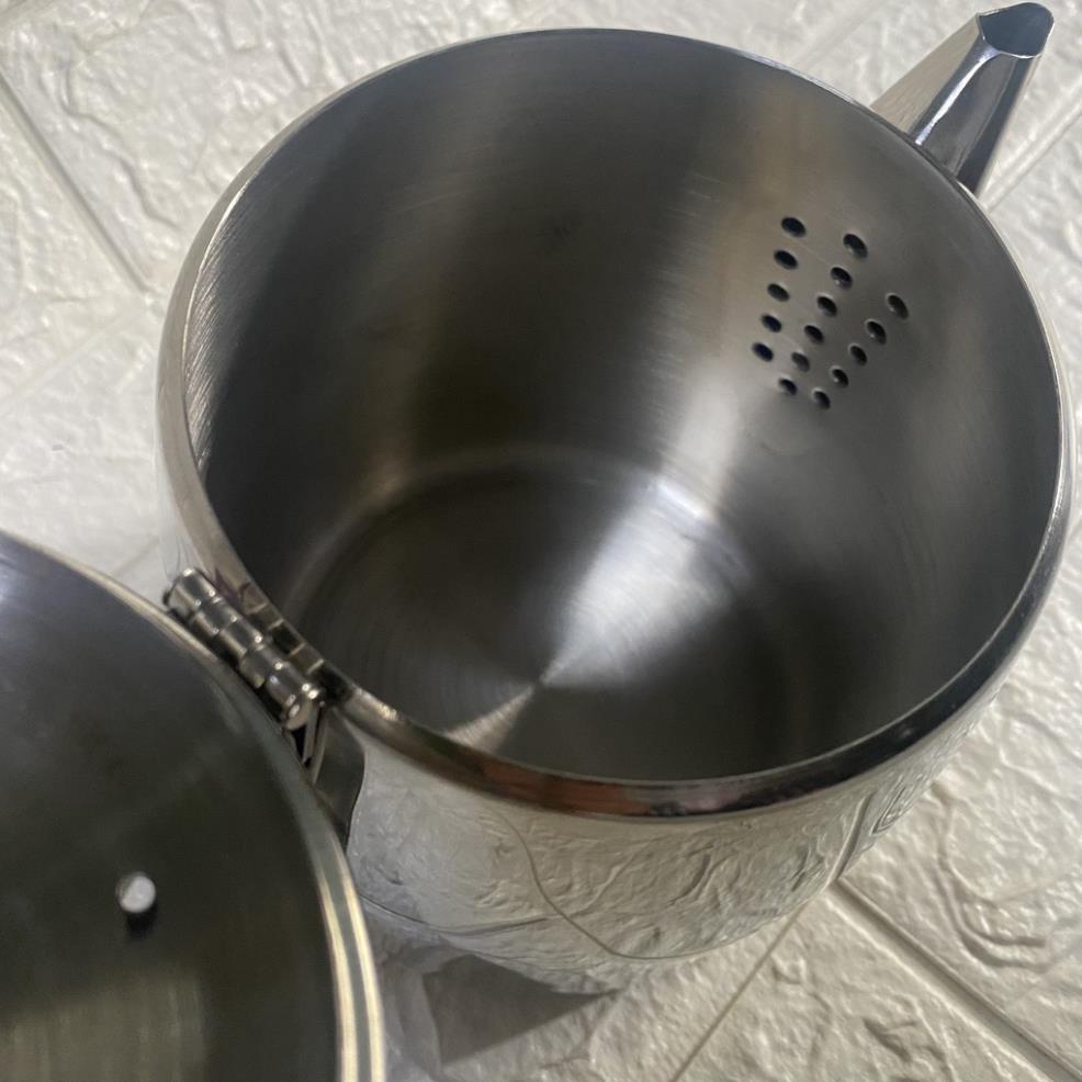 Ca inox 304 có vòi rót. Dùng được bếp từ. Nấu nước và giữ ấm. Dung tích 1.8 - 2.0 lít