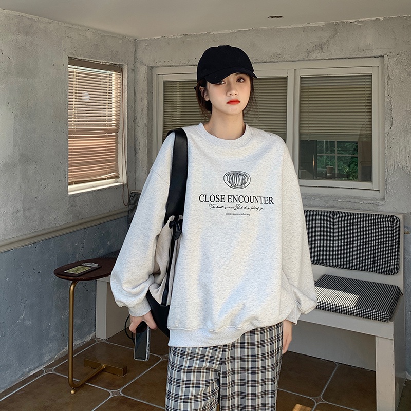 Áo thun tay dài dáng rộng in chữ phong cách Hàn Quốc thời trang cho nữ