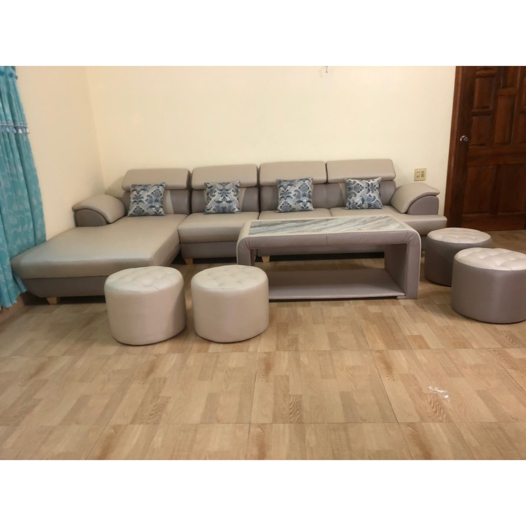 Bộ bàn ghế sofa da phong khách cao cấp bao gồm 1 ghế sofa góc L + 1 bàn gỗ + 2 đôn