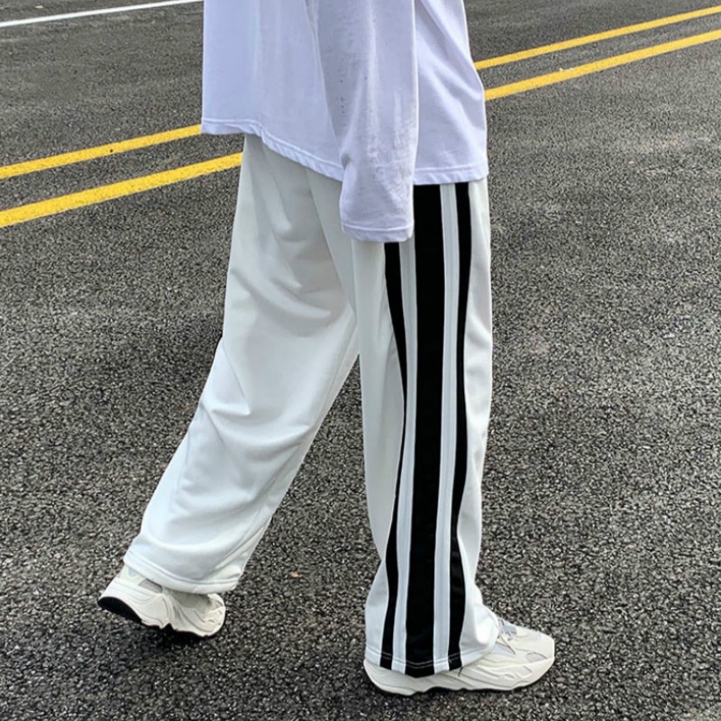 Quần dài ống rộng kẻ sọc phong cách Hàn Quốc thể thao quần nam ống suông trắng thời trang quần dài sọc retro cho nam nữ
