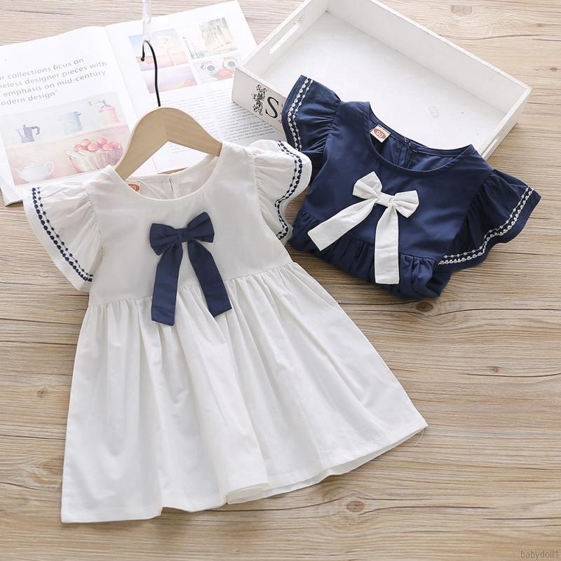 Đầm bé gái thắt nơ dễ thương xinh xắn