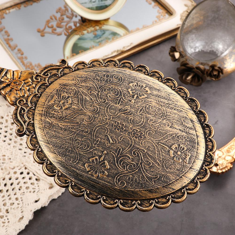 Gương Trang Điểm Cầm Tay Hình Oval Kèm Giá Đỡ Tiện Dụng