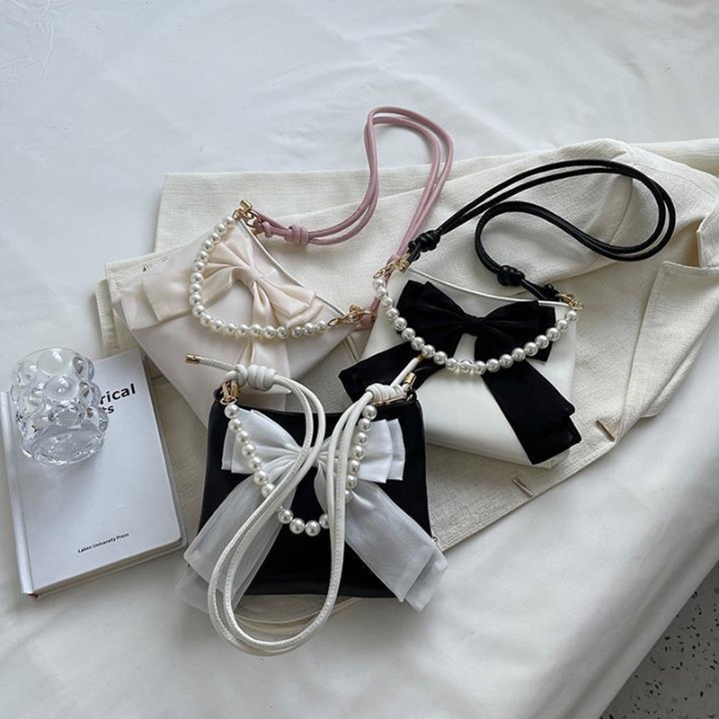 Túi đeo chéo Ielgy dạng xô thắt nơ thích hợp cho tất cả các phong cách dành cho bạn nữ