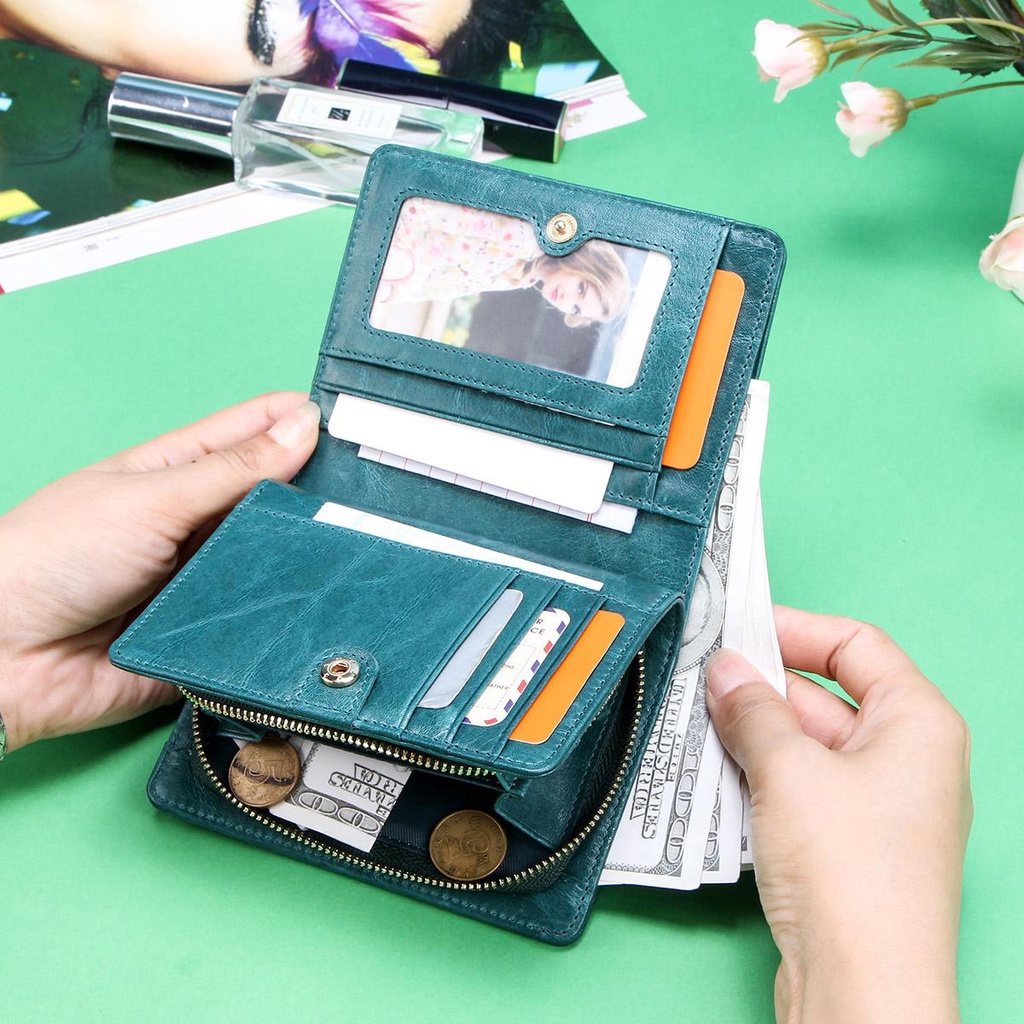 Ví CONTACT'S da thật thêu họa tiết dập nổi có dây kéo thời trang cho nữ