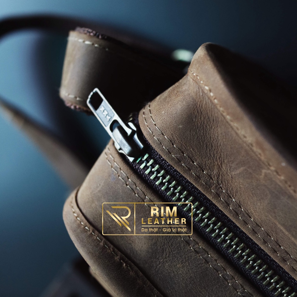 Túi đeo chéo dáng ngang. Bảo hành 2 năm