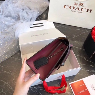 Túi đeo chéo Coach