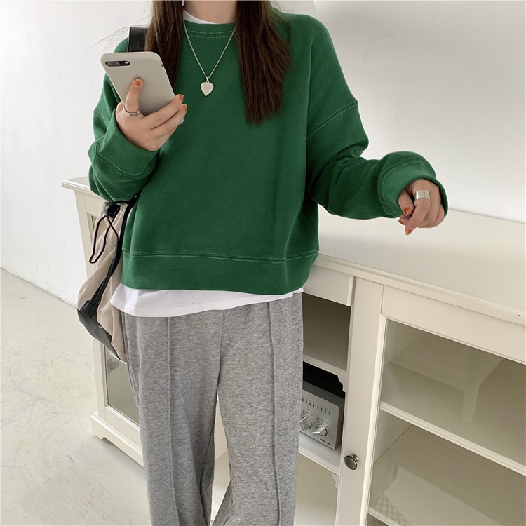 Áo sweater tròng đầu dáng rộng màu trơn phong cách Hàn Quốc