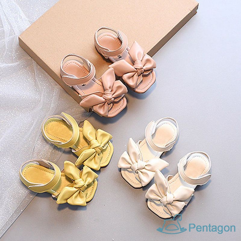 Xăng đan Đế Mềm Chống Trượt Quai Dán Đính Nơ Xinh Xắn Cho Bé Gái