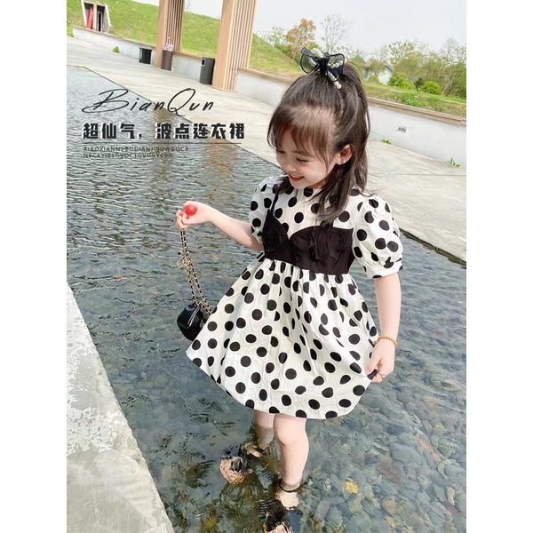 Váy chấm bi đũi lụa cho bé gái