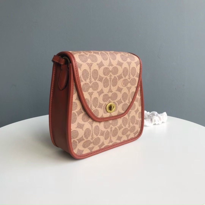 TÚI COACH TURNLOCK 109