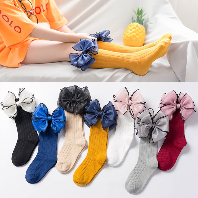 Đôi vớ cotton mềm ấm dài đến đầu gối thắt nơ đáng yêu cho bé gái